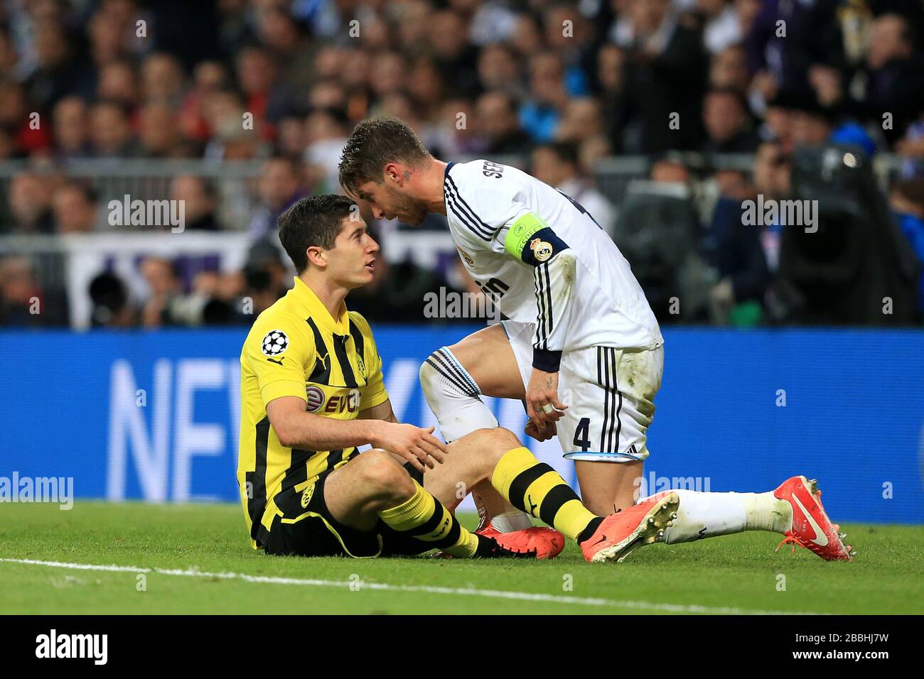Real Madrid's Sergio Ramos and Borussia Dortmund's Robert (left) argue Stock Photo -