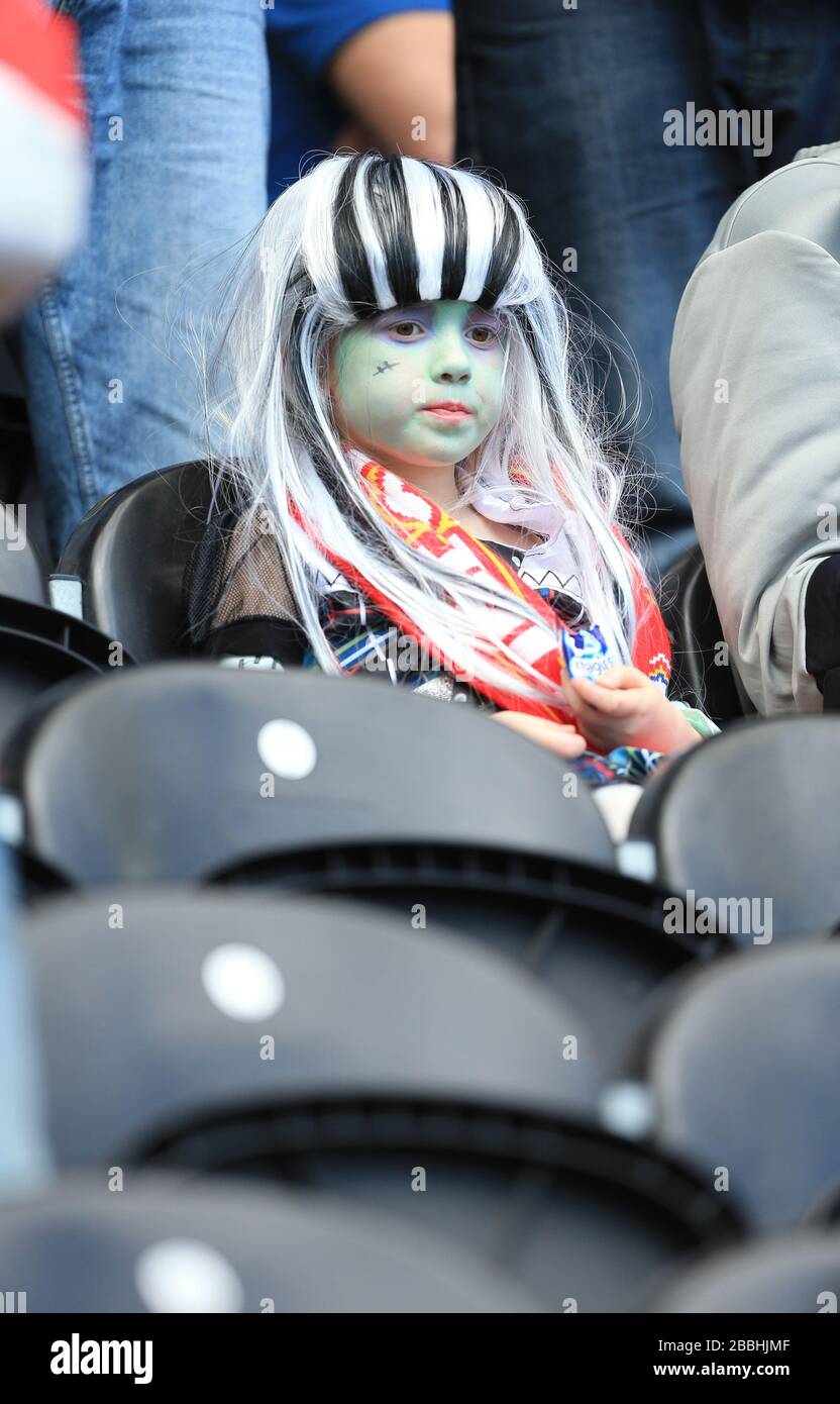 Cardiff City fans come in fancy dress Stock Photo Alamy