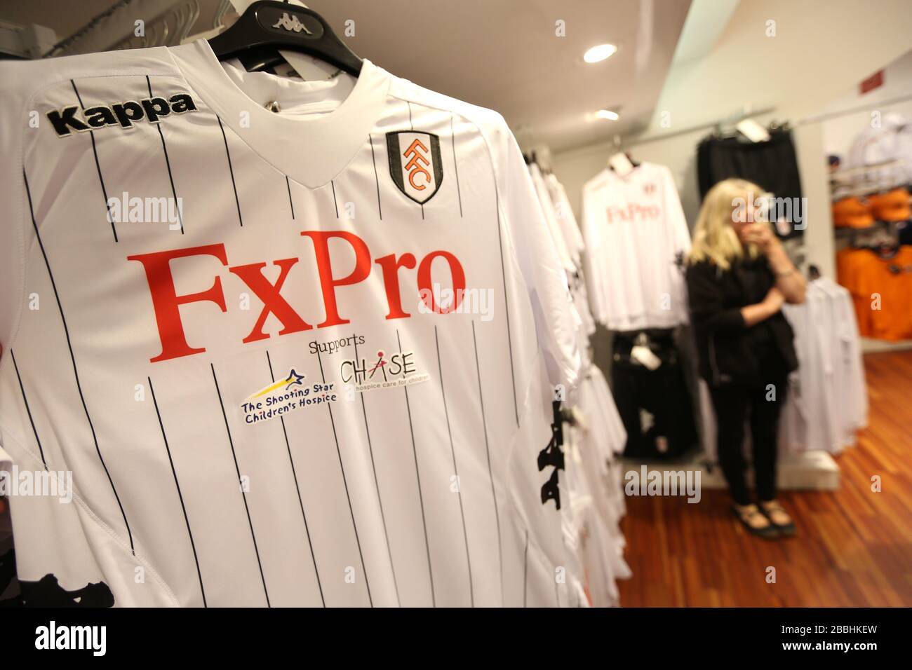 A Shooting Star Chase on a Fulham shirt in the club shop Stock