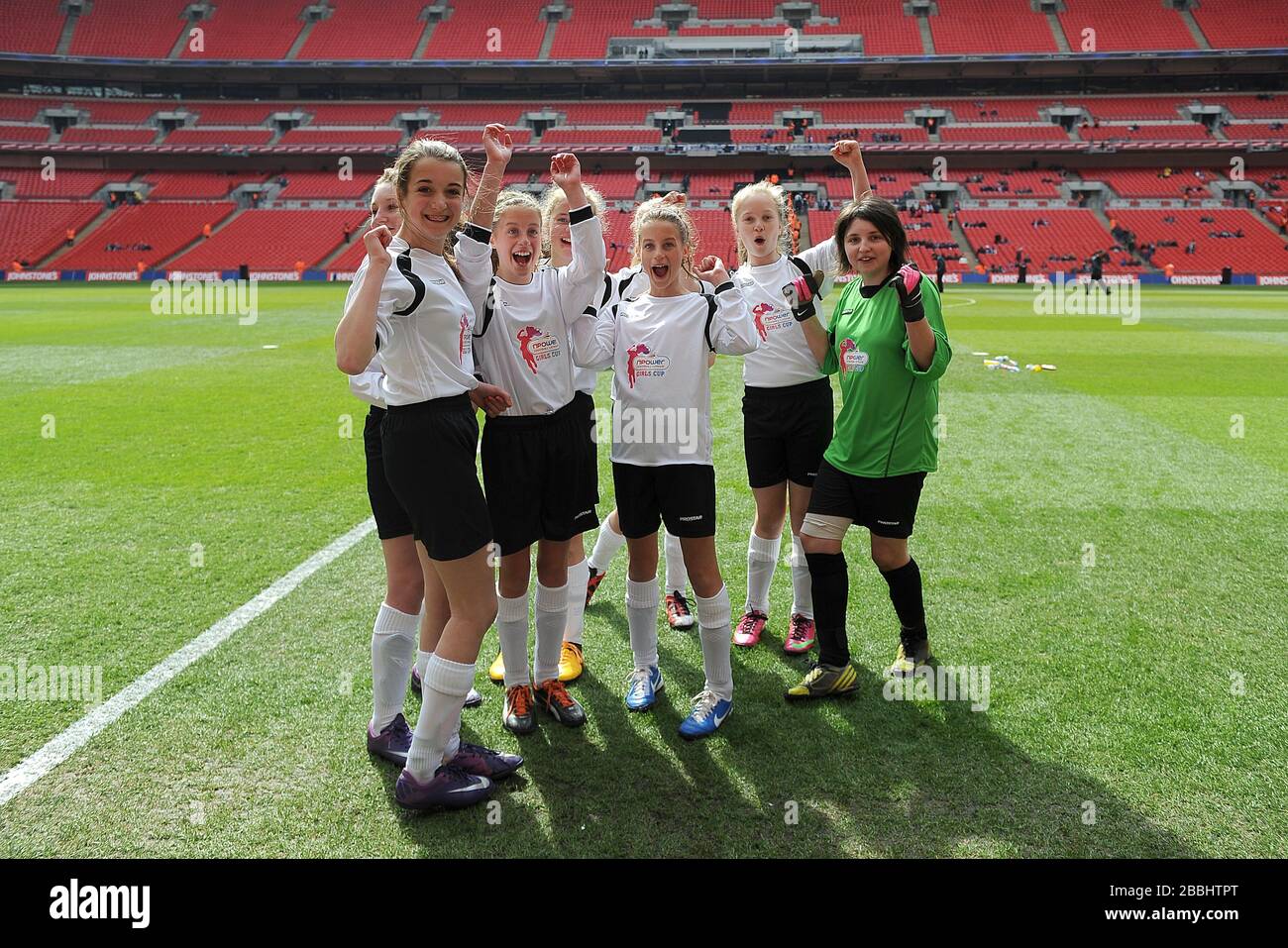 Woodlands School celebrate their victory in the Football League Girls