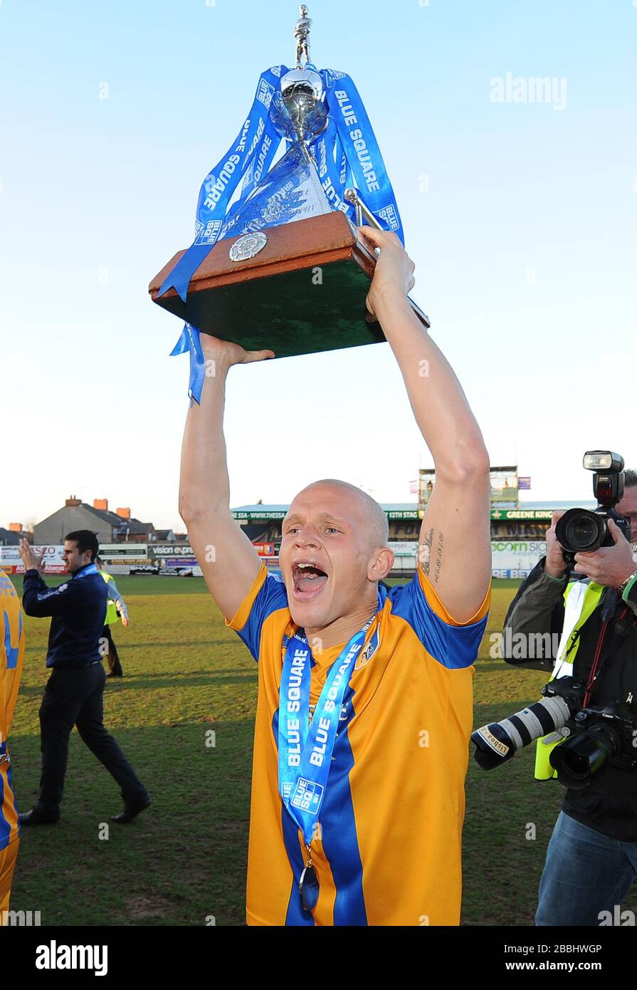 Mansfield Town's Lindon Meikle celebrates with The Blue Square Premier League trophy. Stock Photo