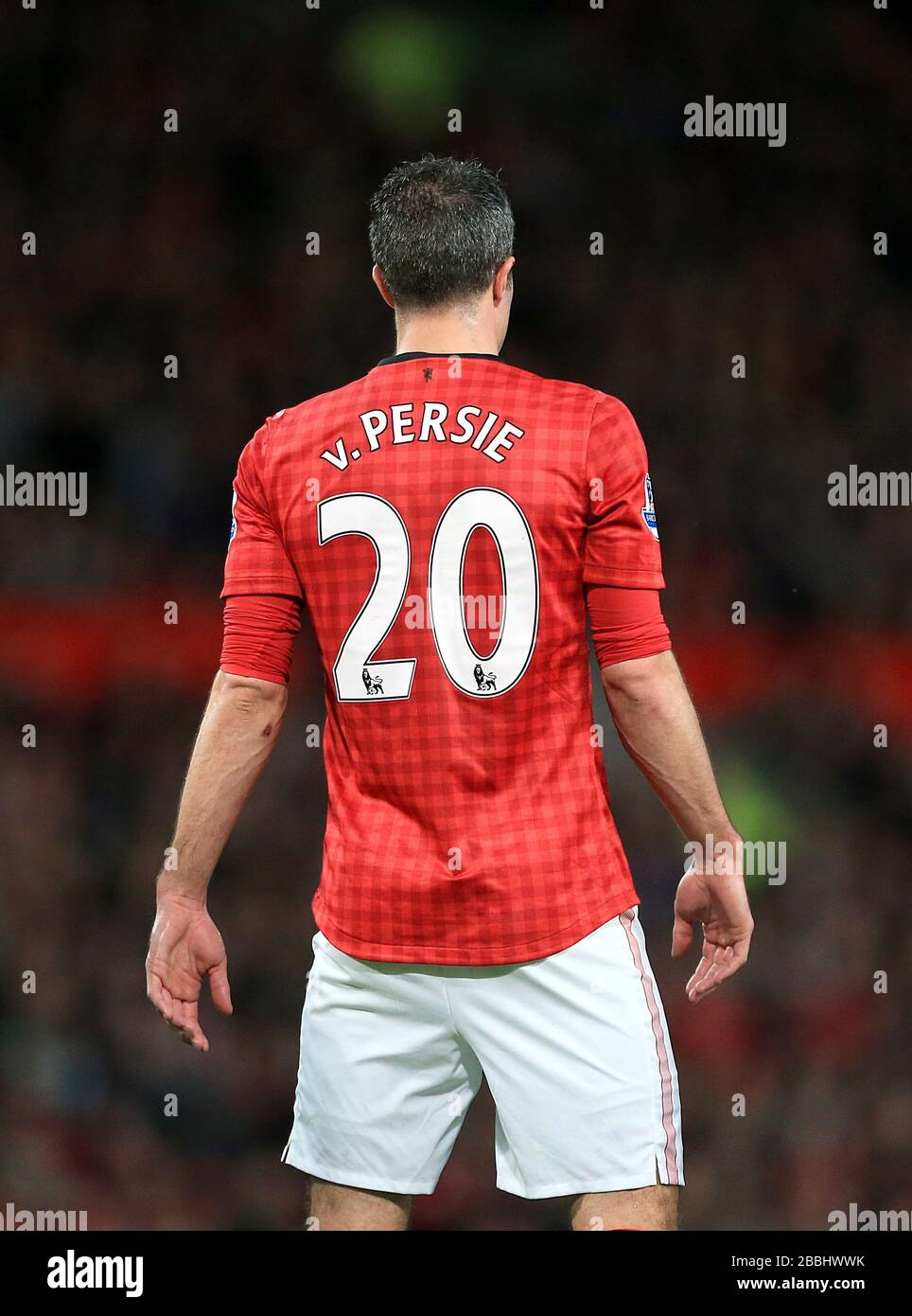 Manchester United's Robin van Persie wears number 20 in the season that his  team could go on to win their 20th league title Stock Photo - Alamy