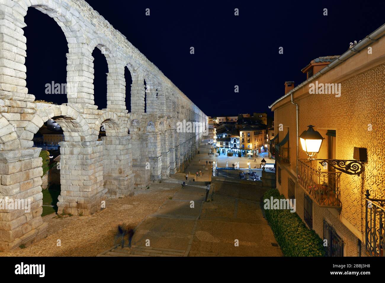 Ancient Roman aqueduct closeup view in Segovia at night Stock Photo - Alamy
