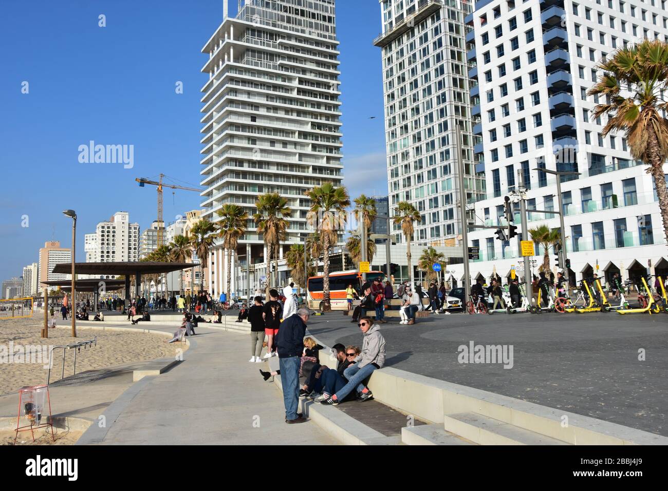 Tel Aviv's boardwalk, The Tayelet, is generally packed all day with joggers, bicyclists, and Tel Avivians just enjoying the beautiful sea side view Stock Photo