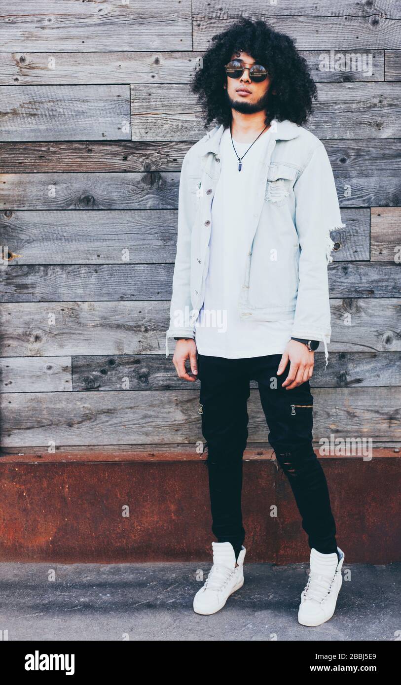 Portrait young handsome fashion bearded model man in urban. Afro Hairstyle. Stock Photo