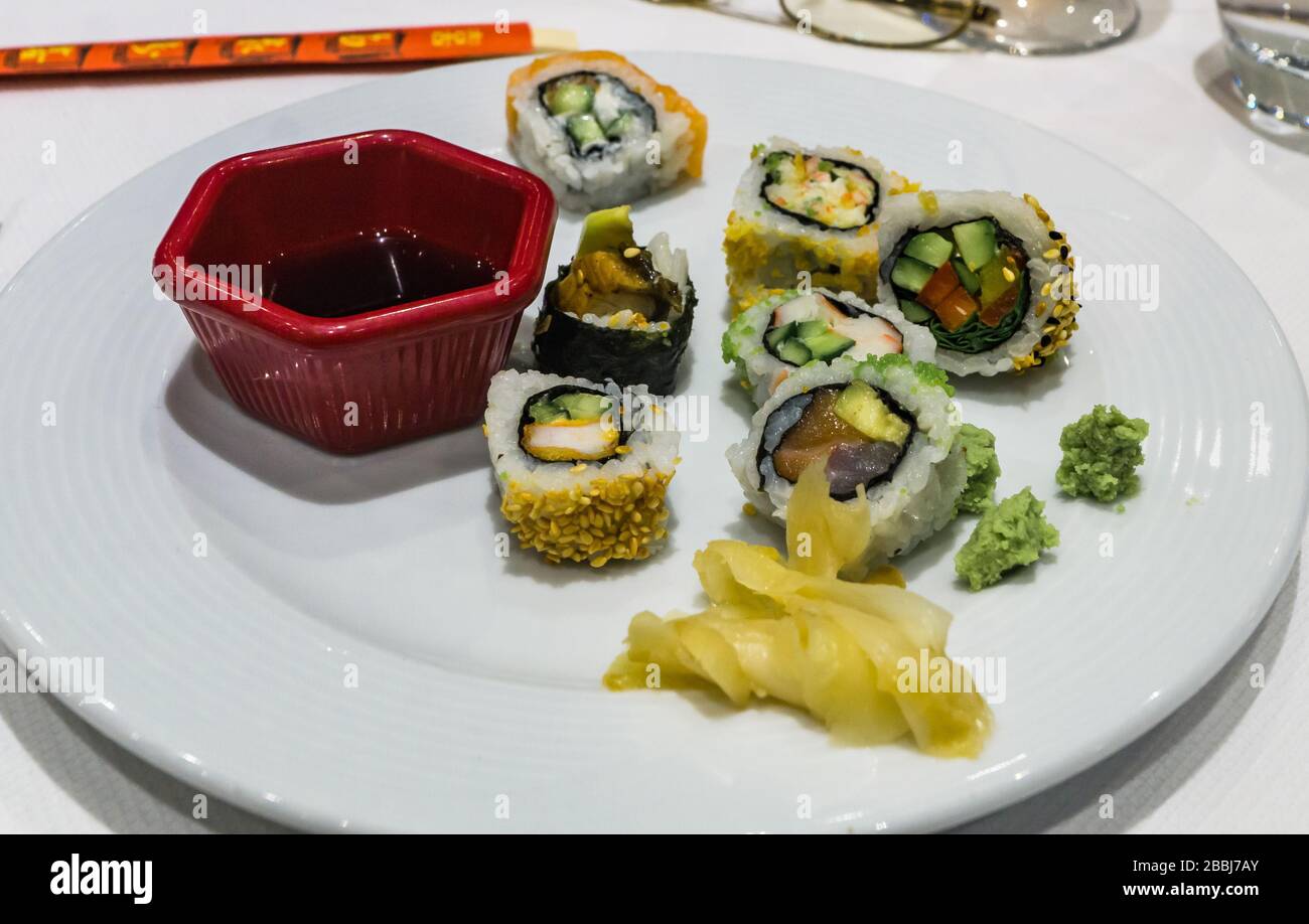 a plate of sushi rolls Stock Photo