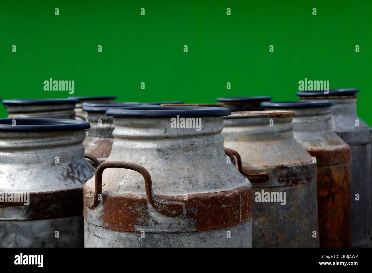 group of old metal cans for milk transport and handling Stock Photo