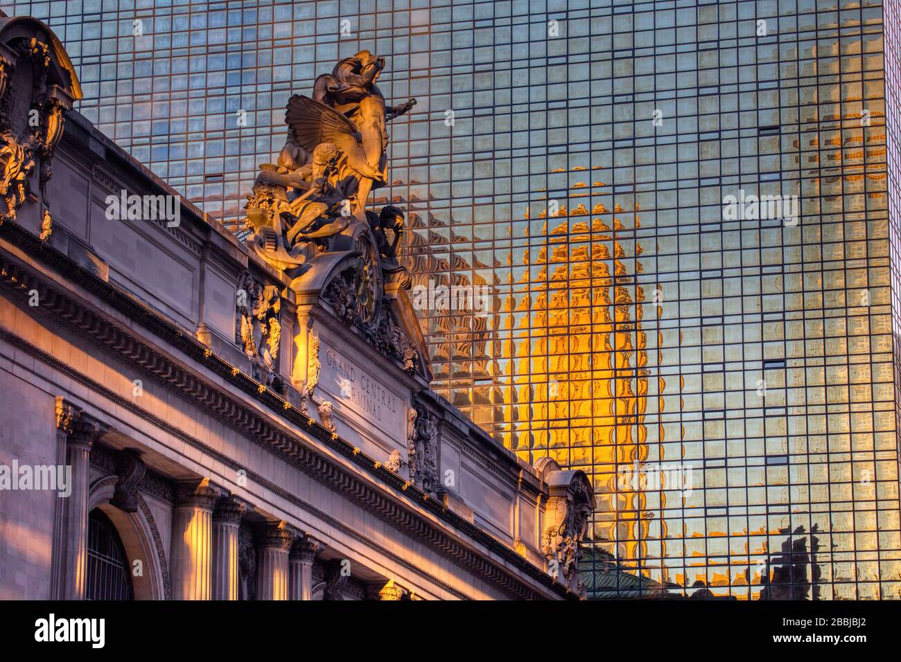 Grand Central Terminal 42nd Street facade with Grand Hyatt NY as backdrop, early morning. Stock Photo