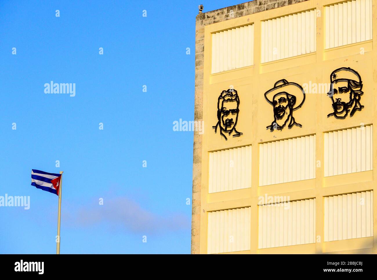 Government building and Cuban flag, Havana Vieja,  Cuba Stock Photo