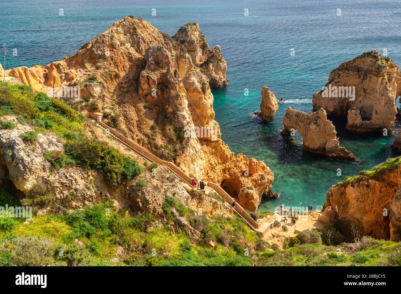 Lagos, Portugal - 6 March 2020: Tourists visiting Ponta da Piedade Stock Photo