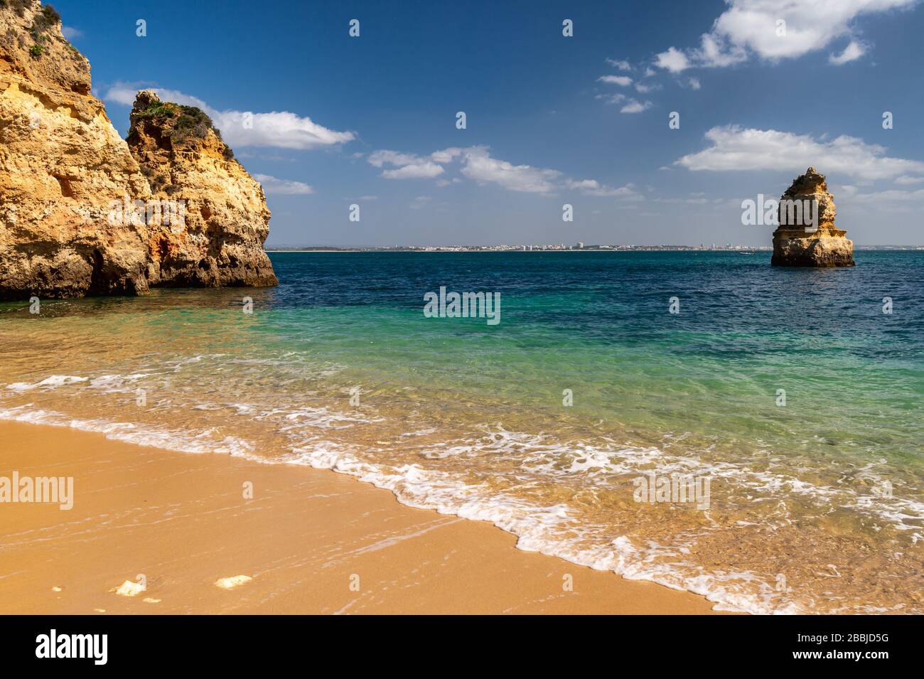 Atlantic ocean and cliffs at Praia do Camilo Beach, Lagos, Portugal Stock Photo
