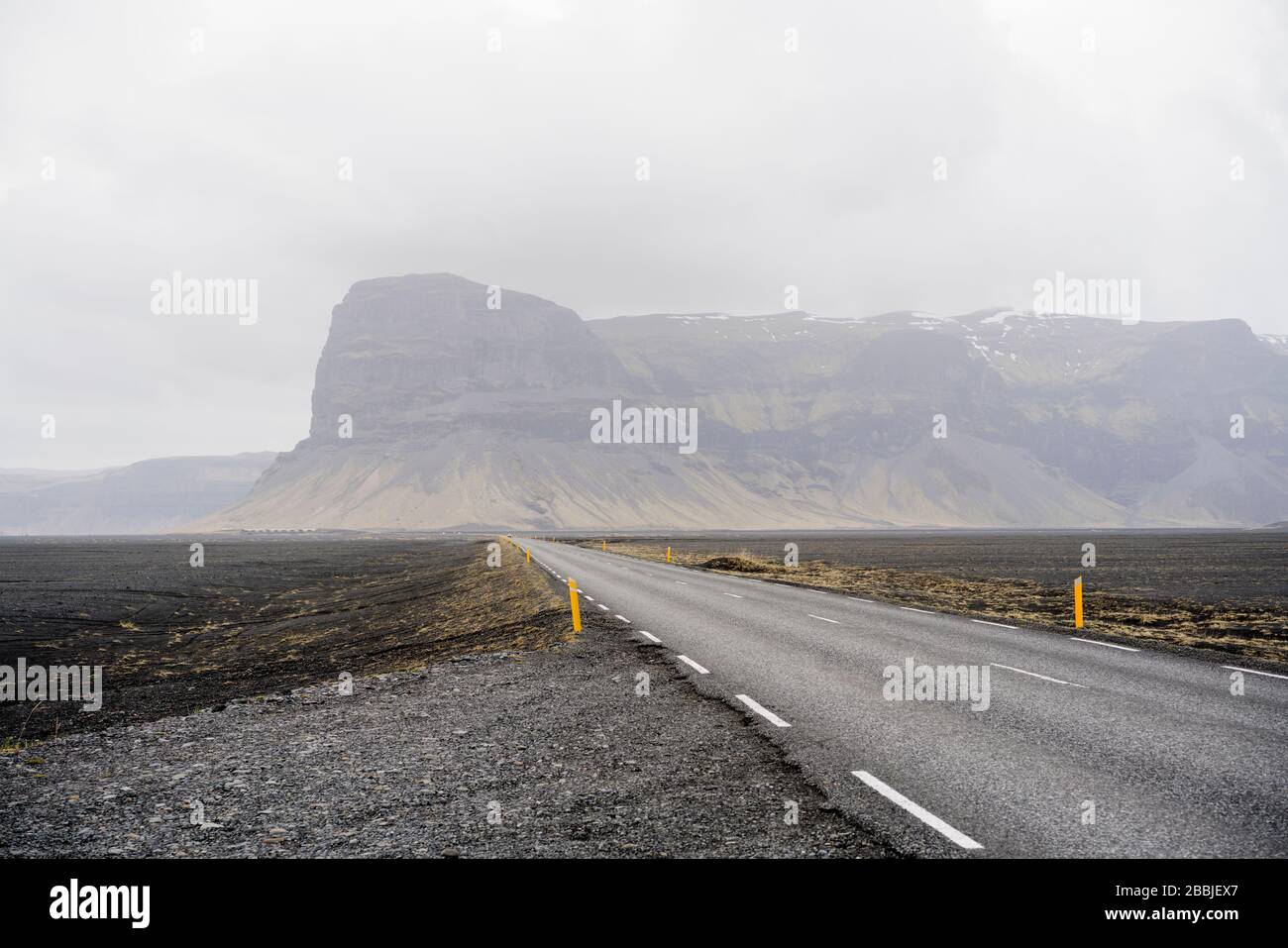 Empty road in east iceland near Mt. LÃ³magnÃºpur Stock Photo
