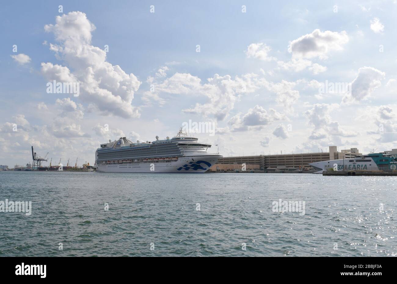 Fort Lauderdale, Florida, USA. 31st March, 2020. the Port Director for Port Everglades said he was caught completely blindsided today by Crown Princess arriving with crew needing medevac. He stated this violated federal law and that the CDC and USCG were not informed either. The Carnival rep stated that Princess contacted Broward Health directly, and another Broward Commissioner had the CEO of Broward Health on the phone contesting the veracity of that statement at Port Everglades dock. Crown Princess is a Crown-class cruise ship owned and operated by Princess Cruises. Her maiden voyage took p Stock Photo