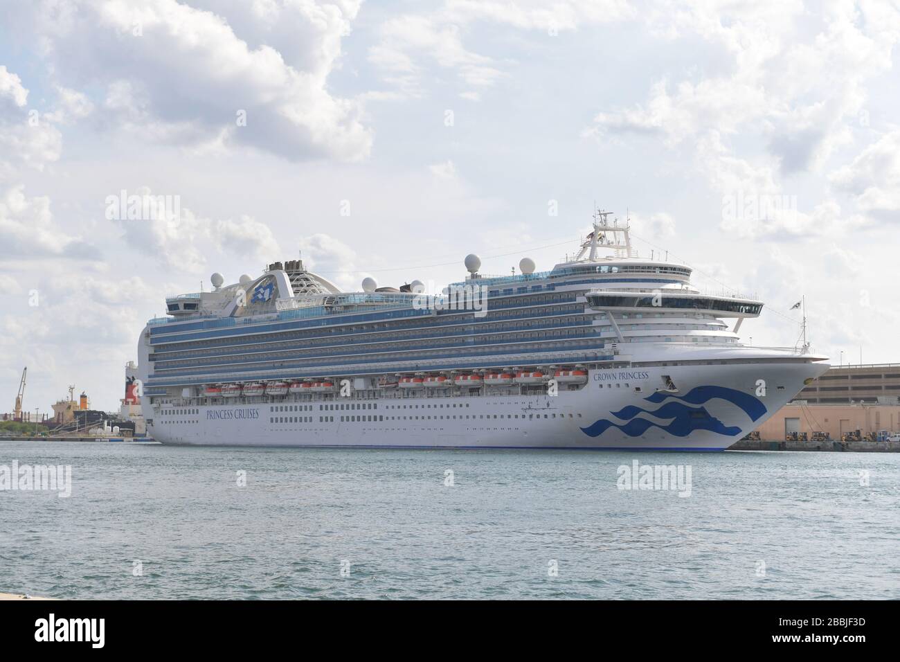 Fort Lauderdale, Florida, USA. 31st March, 2020. the Port Director for Port Everglades said he was caught completely blindsided today by Crown Princess arriving with crew needing medevac. He stated this violated federal law and that the CDC and USCG were not informed either. The Carnival rep stated that Princess contacted Broward Health directly, and another Broward Commissioner had the CEO of Broward Health on the phone contesting the veracity of that statement at Port Everglades dock. Crown Princess is a Crown-class cruise ship owned and operated by Princess Cruises. Her maiden voyage took p Stock Photo