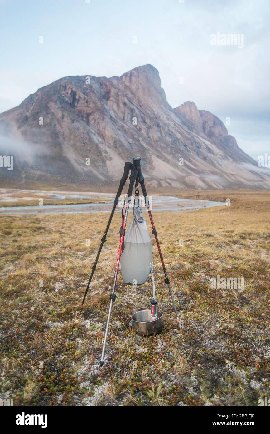 Gravity Fed Water Filter Held By Tripod Made With Trekking Poles Stock Photo Alamy