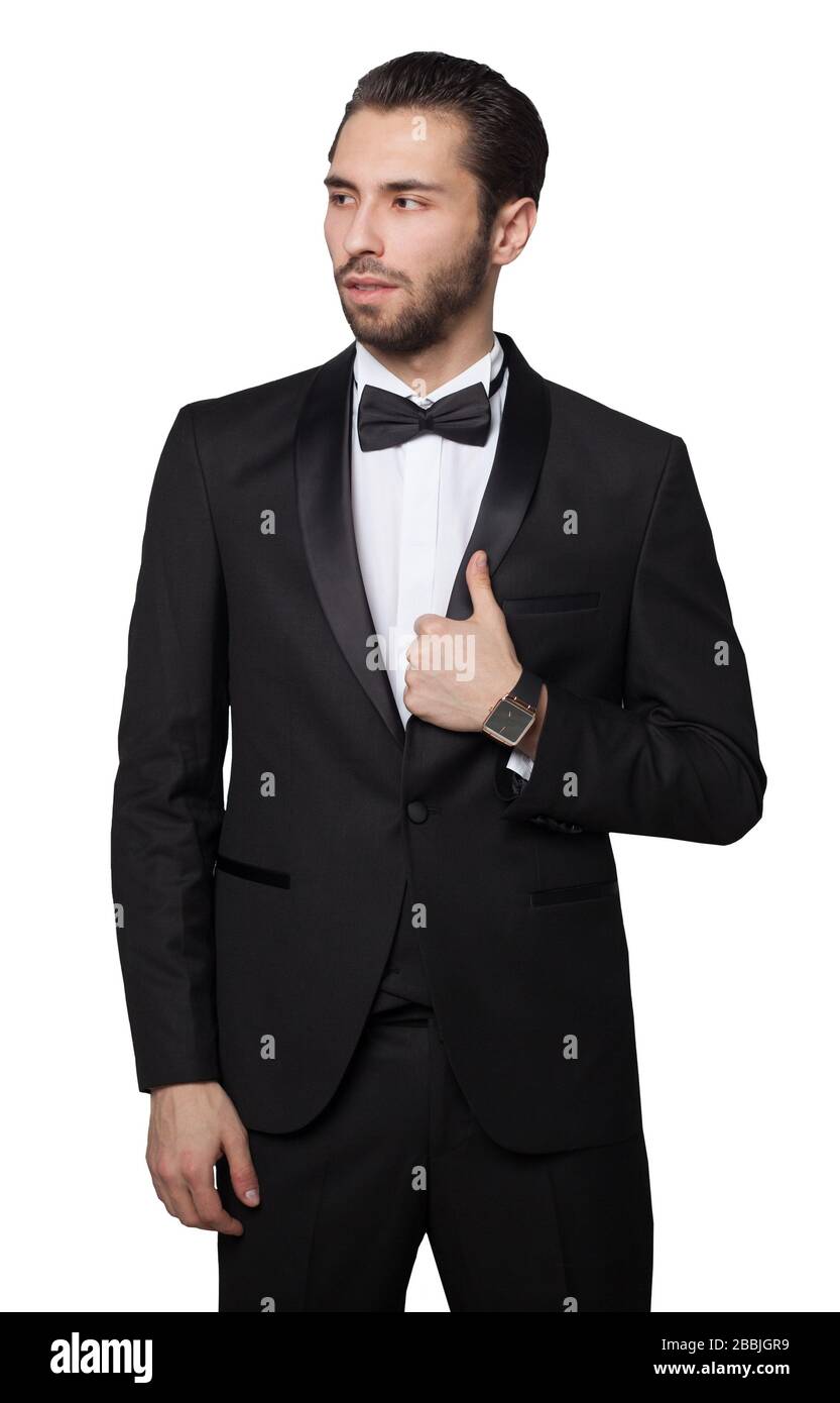 Shark of capitalism. Young male businessman showing. He is dressed in a strict black suit. Rich. Stock Photo