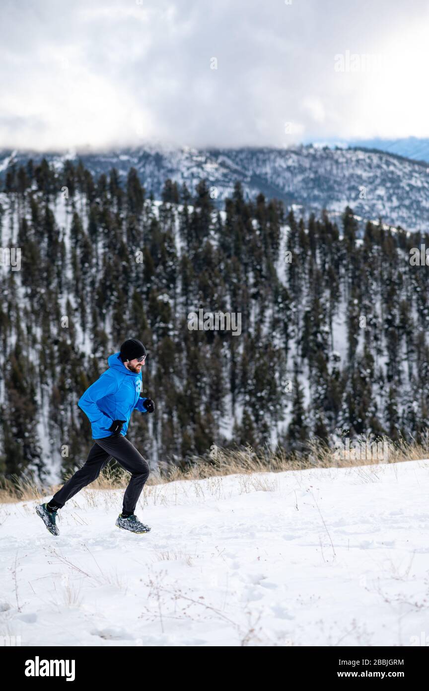 Runner working hard to get up to the top of Mount Sentinel in Missoula MT. Stock Photo