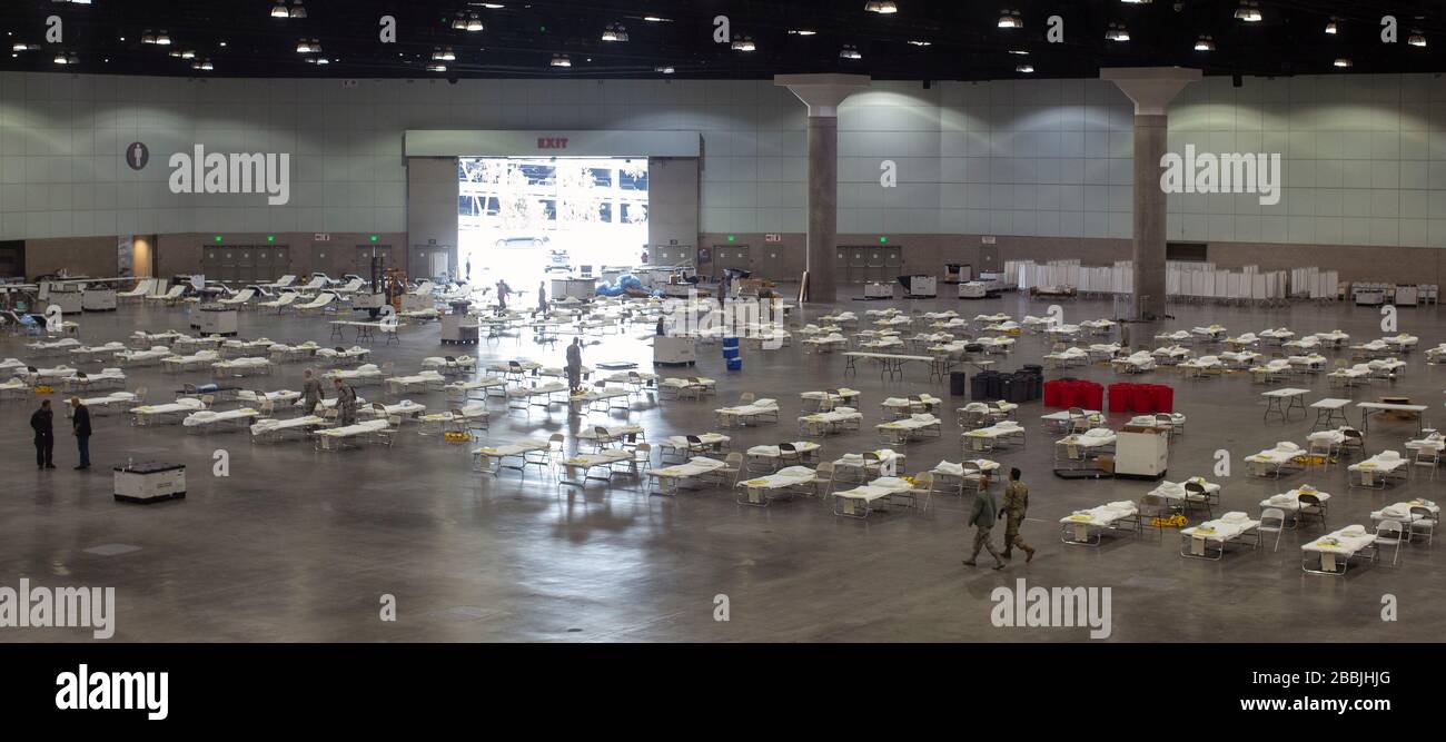 Hundreds of hospital beds cover the floor at a Federal Medical Station COVID-19, coronavirus pandemic relief facility set up at the Los Angeles Convention Center March 29, 2020 in Los Angeles, California. Stock Photo