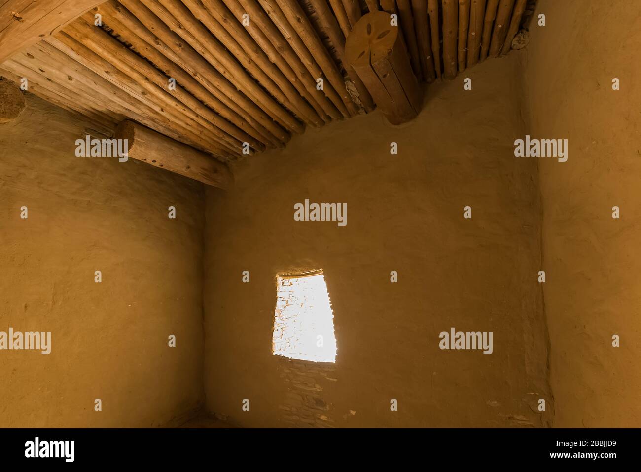 Ceiling details of vigas and latillas in a room within Pueblo Bonito in