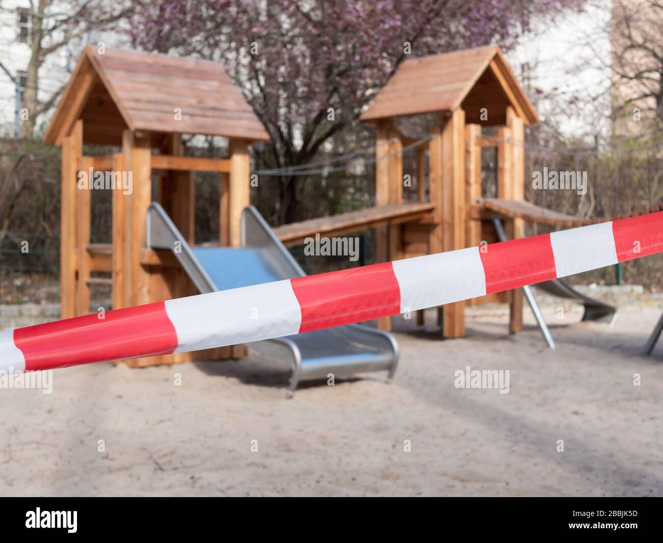Closed Playground With Barrier Tape Due To Corona Pandemic In Berlin, Germany In March 2020, Selected Focus Stock Photo