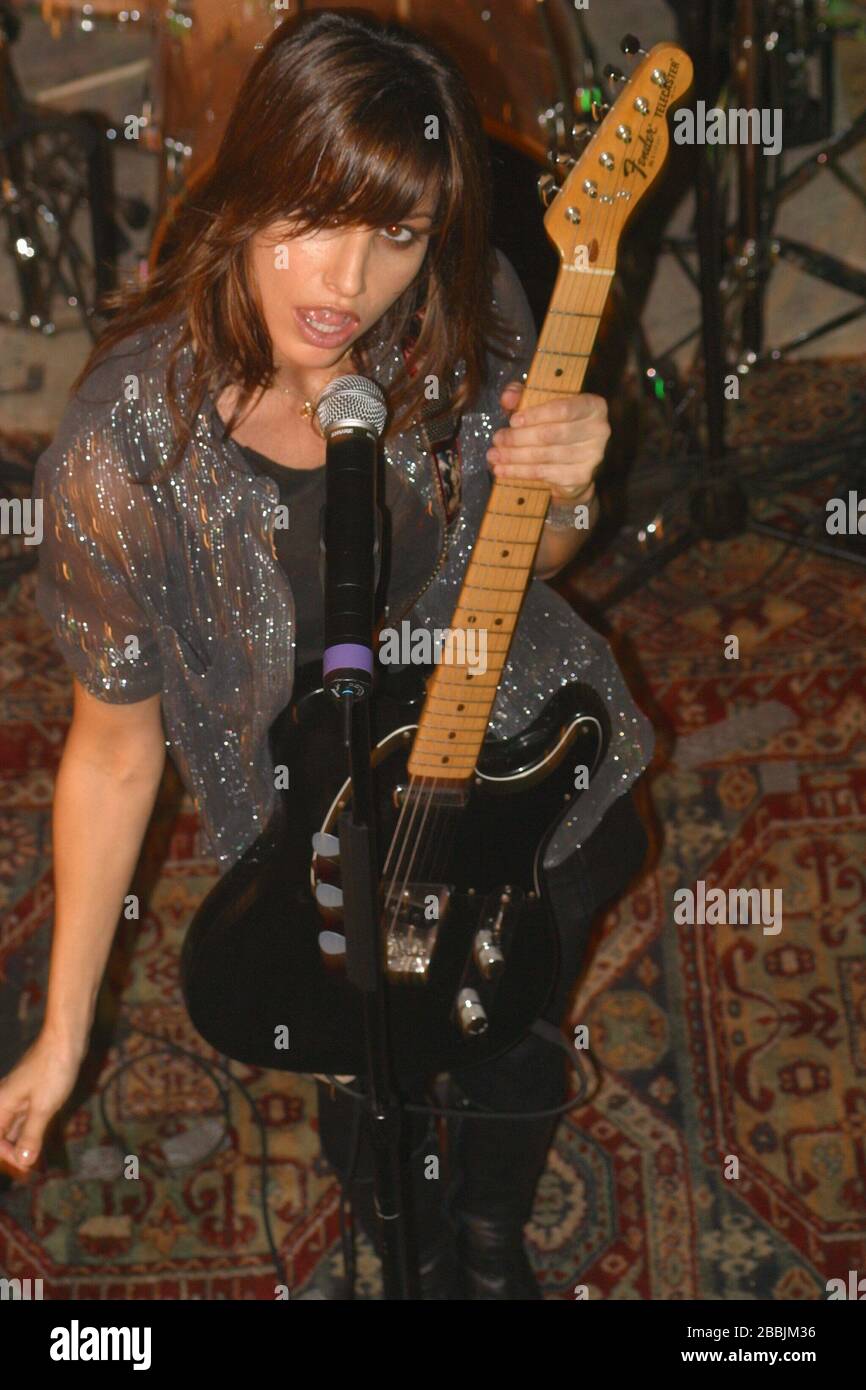 Gina Gershon performing with her band at the North Star Bar in