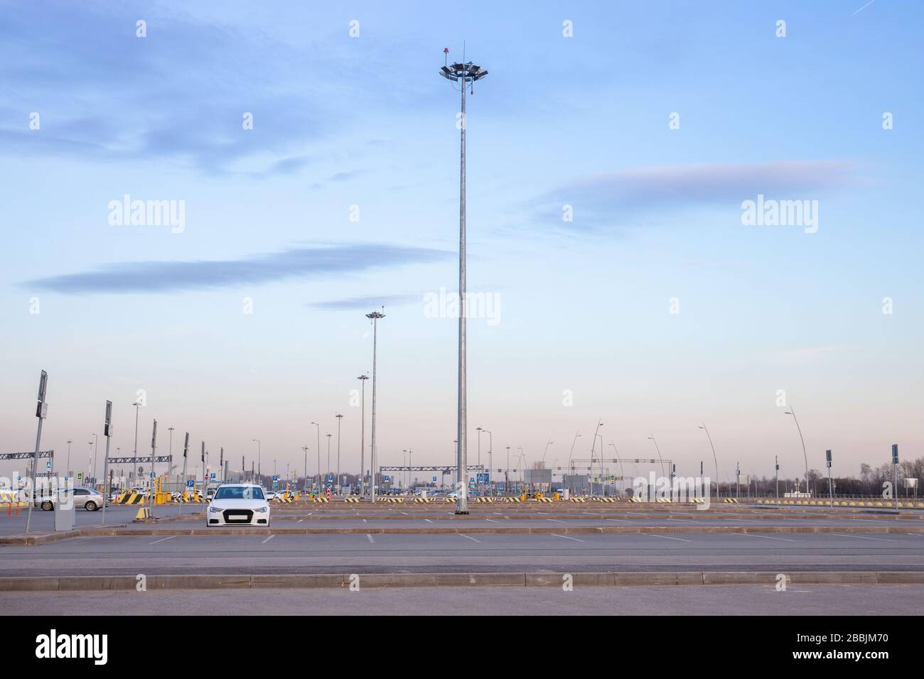 Empty airport parking after closure flights due to coronavirus/covid-19 and outbreak travel restrictions. Travel industry financial crisis, stop of fl Stock Photo