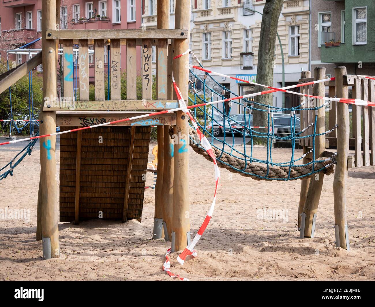 BERLIN, GERMANY - MARCH 31, 2020: Closed Playground With Barrier Tape Due To Corona Pandemic In Berlin, Germany Stock Photo