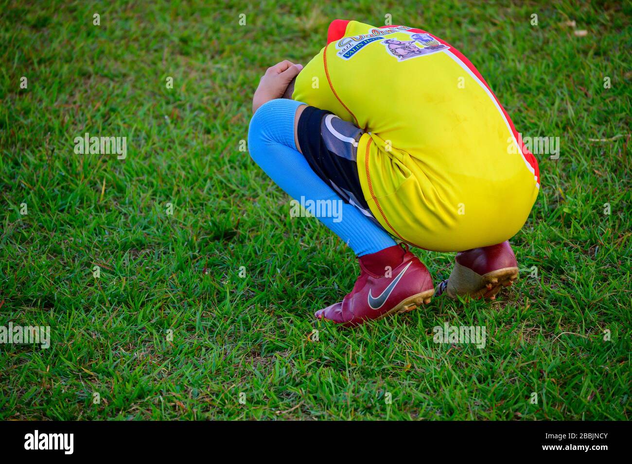 Boy in anguish after goal is scored and game lost, Vinales, Pinar del Rio Province, Cuba Stock Photo