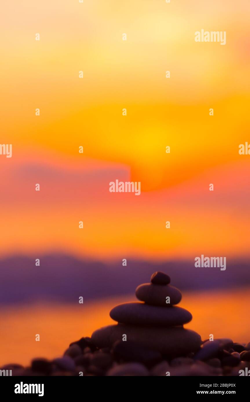 stack of zen stones on pebble beach Stock Photo - Alamy