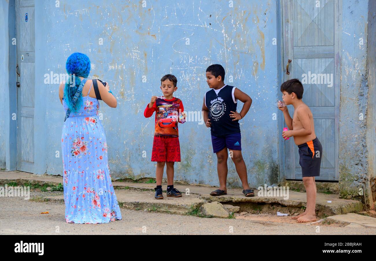 Toursit photographs children, Vinales, Pinar del Rio Province, Cuba Stock Photo