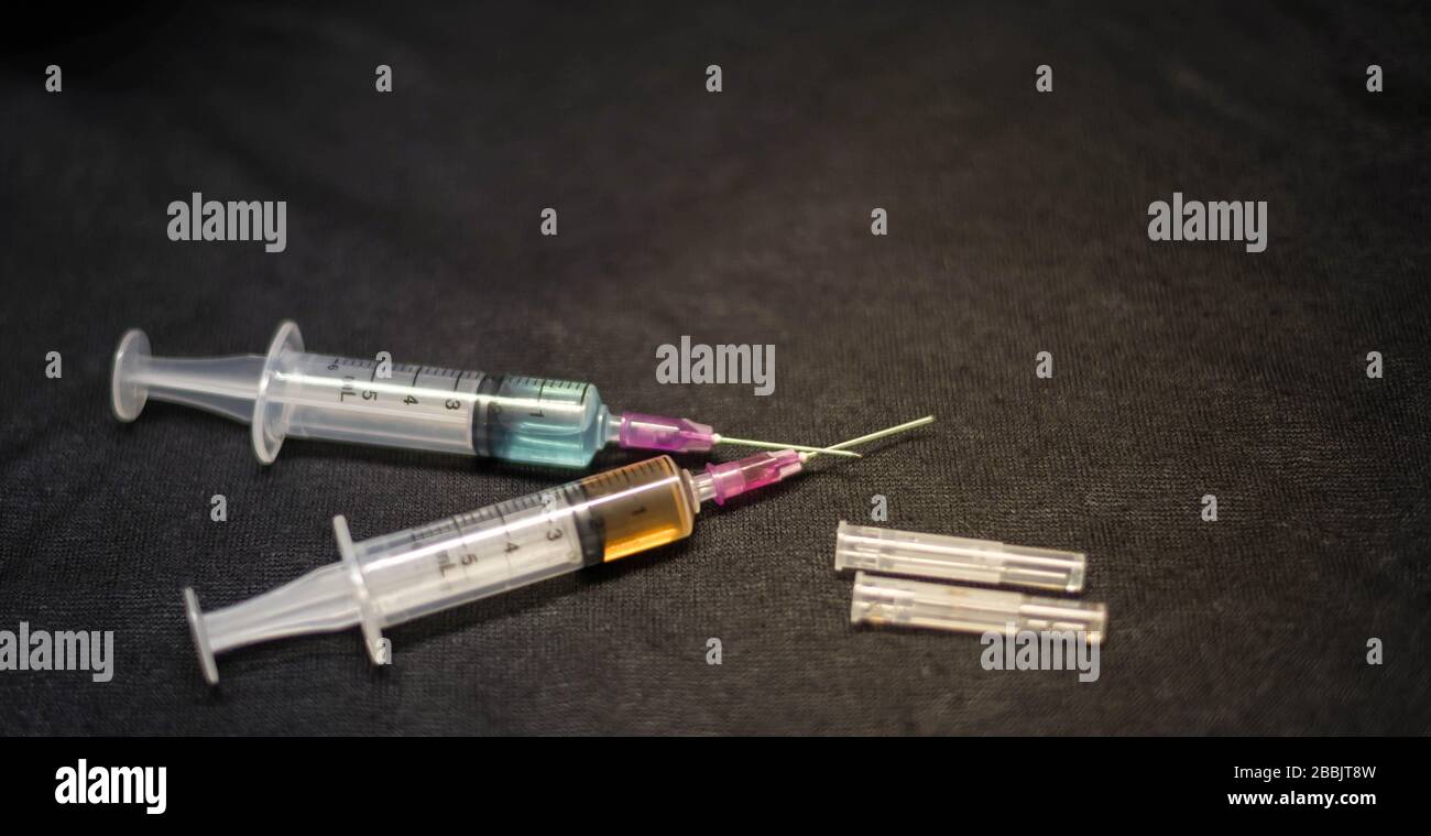 Syringe medical injection with medicine plastic vaccination equipment with needle. vaccination to patient for coronavirus (COVID-19) protection. Coron Stock Photo
