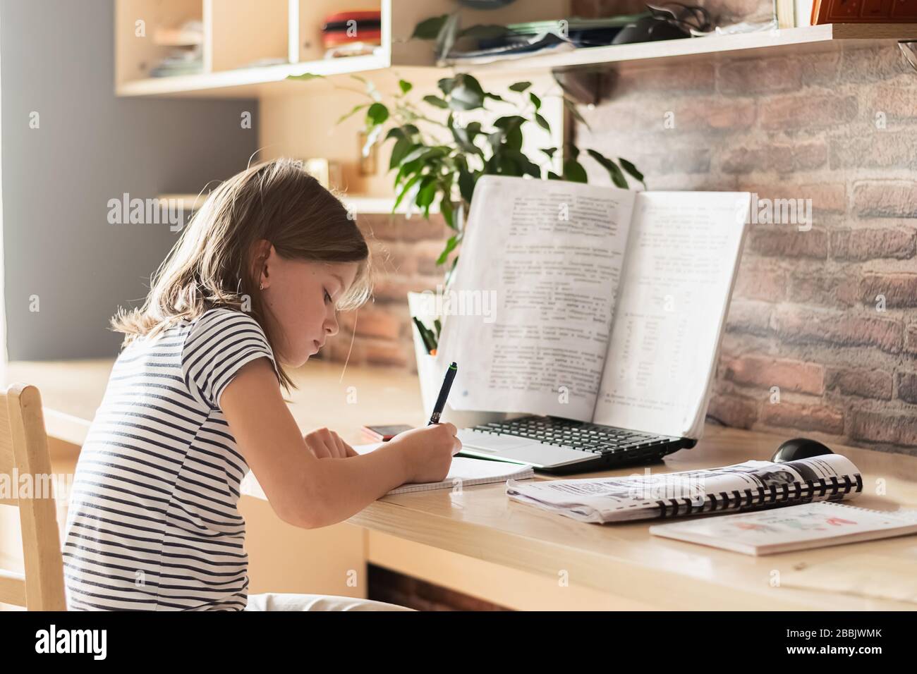The concept of distance online learning self-isolation. Child sitting ...