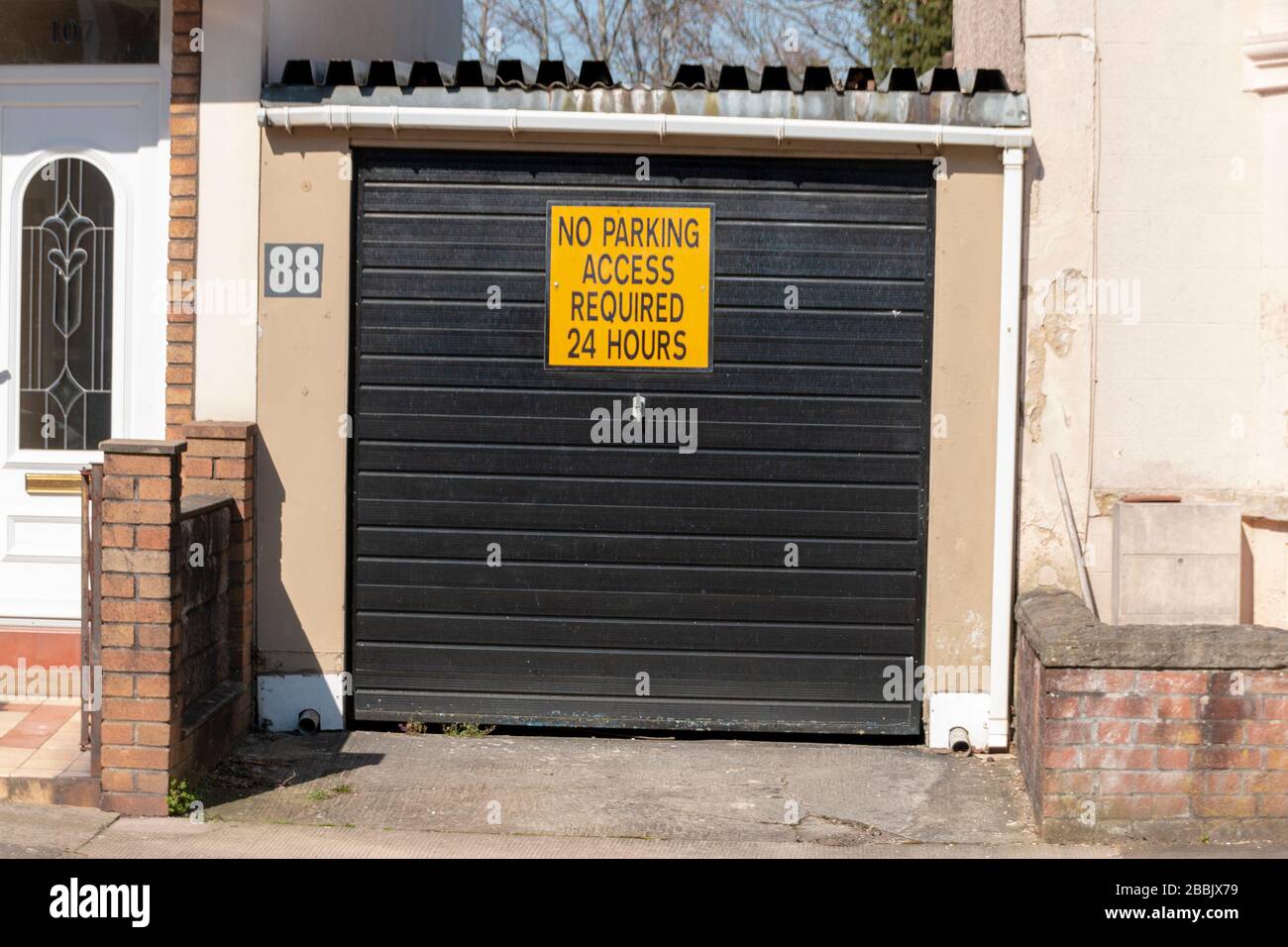 Bristol-March 2020-England-a close up view of a no entry and no parking sign on a garage door Stock Photo