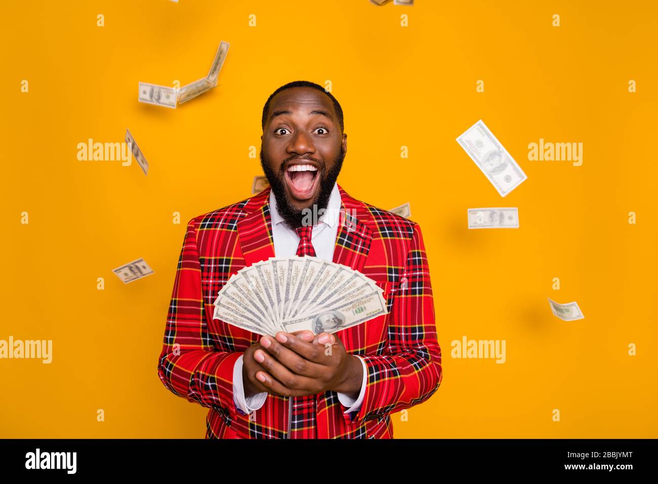 Photo of excited dark skin guy hold hands fan of usa bucks rich person