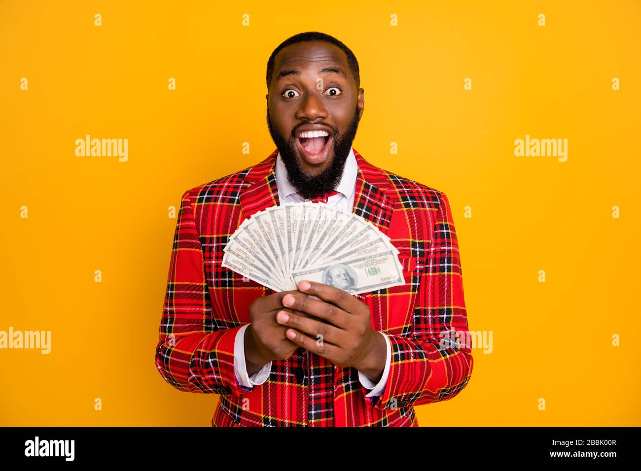 Photo of attractive dark skin guy hold hands fan of usa bucks open