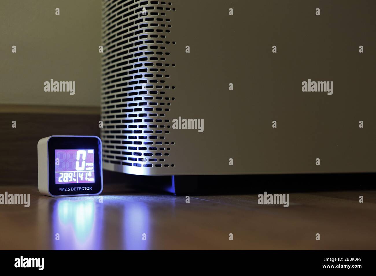 testing air purifier efficiency. PM2.5 small particulate matter digital