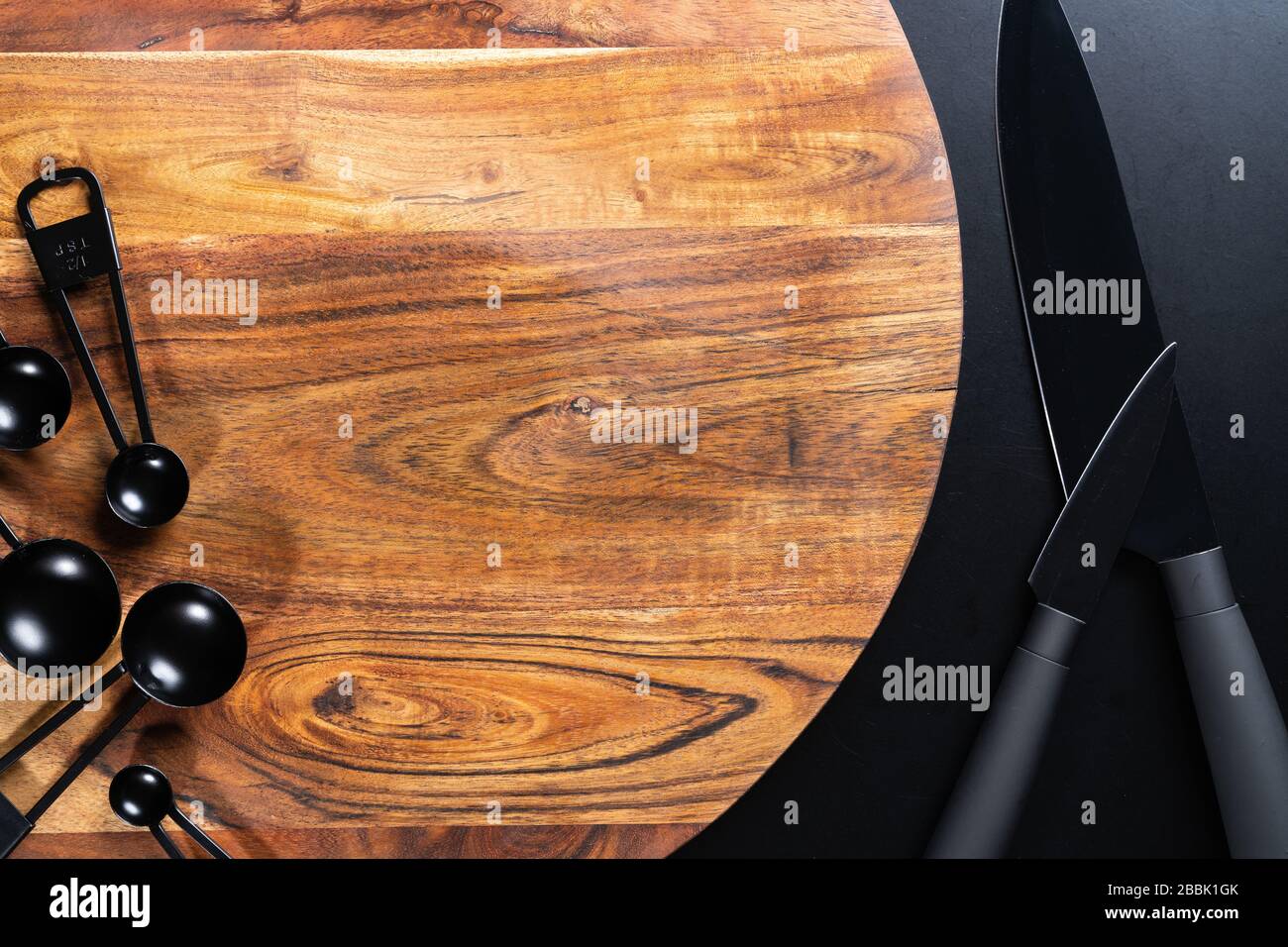 Pastry chef measuring the temperature of the chocolate with an infrared  thermometer, working on the tempering of the chocolate Stock Photo - Alamy