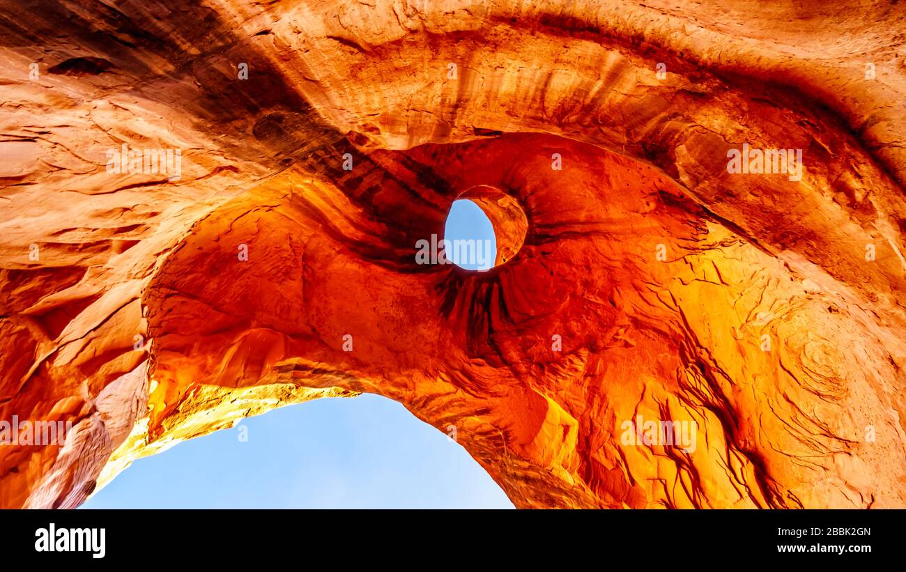 The Eagle Head shape weather stained ceiling the Big Hogan arch, a large arch in Monument Valley Navajo Tribal Park on the Utah and Arizona, USA Stock Photo