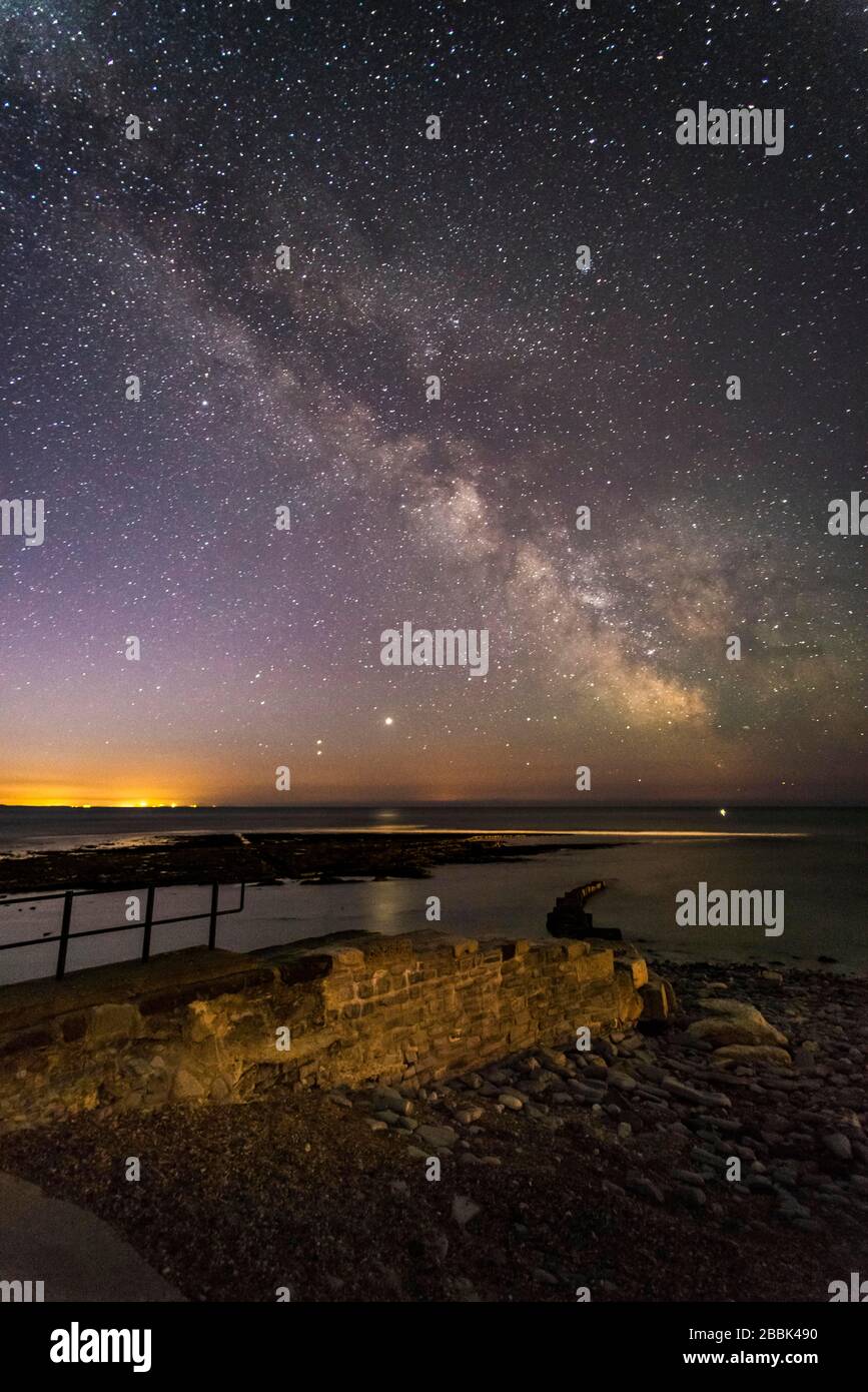 Lyme Regis, Dorset, UK. 1st April 2020. UK Weather. The Milky Way glows