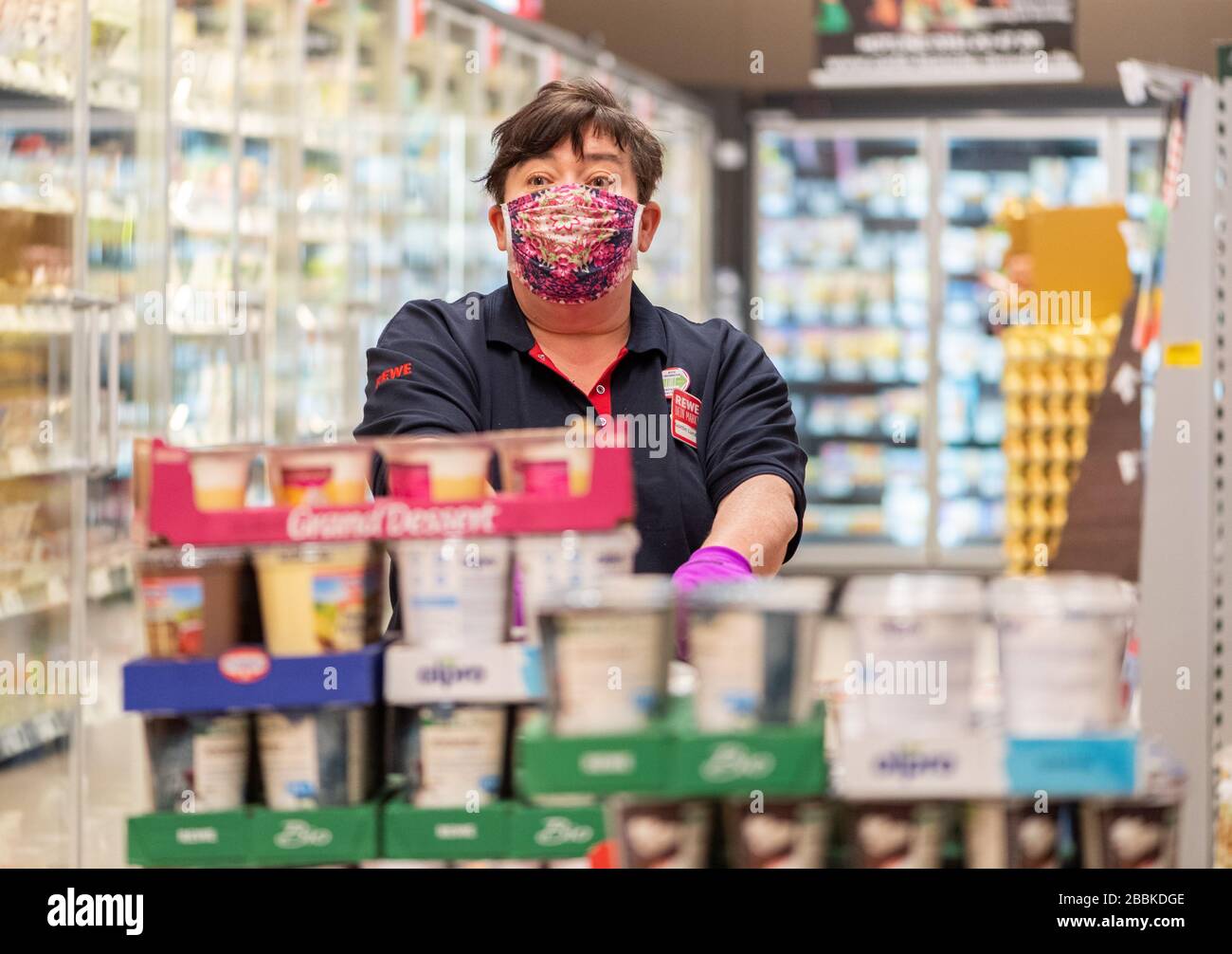 Store employee stocking shelves hires stock photography and images Alamy