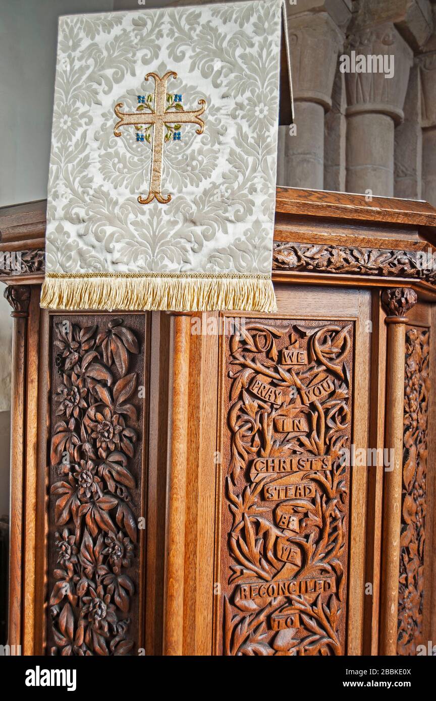 Closeup detail of ornately decorated altar in old church with hanging tapestry Stock Photo Alamy