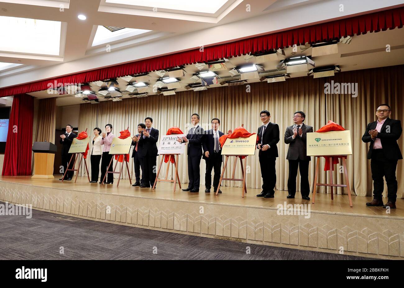 Shanghai, China. 20th Mar, 2020. Guests unveiled the five newly-established foreign financial institutions at an online opening ceremony in Shanghai, east China, March 20, 2020. Credit: Fang Zhe/Xinhua/Alamy Live News Stock Photo