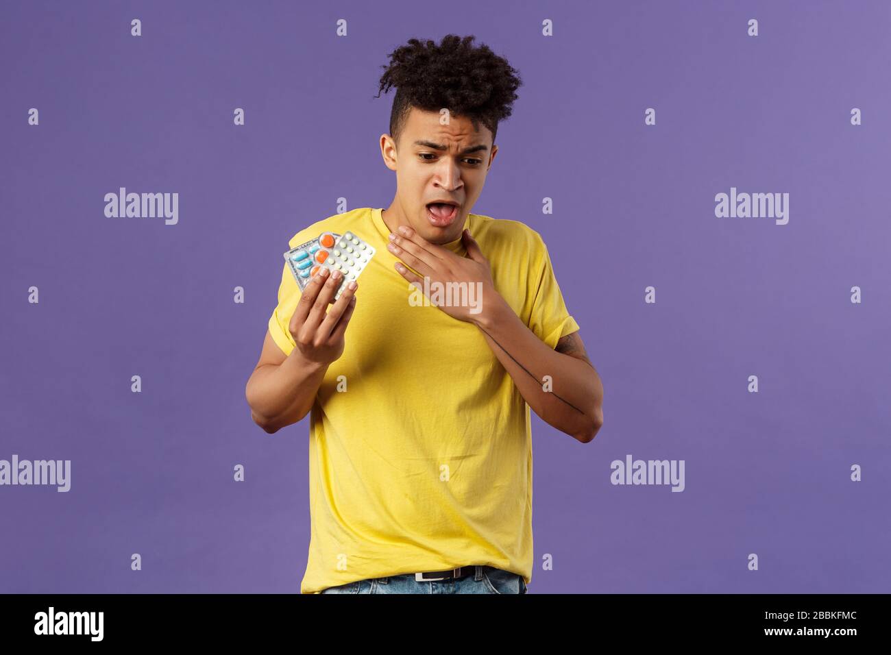 Health, influenza, covid19 concept. Portrait of young man coughing