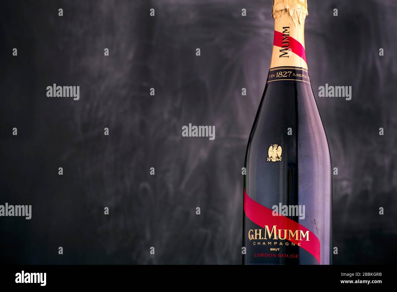 Tambov, Russian Federation - September 07, 2019 Bottle of Champagne G.H. Mumm against black background. Studio shot. Stock Photo
