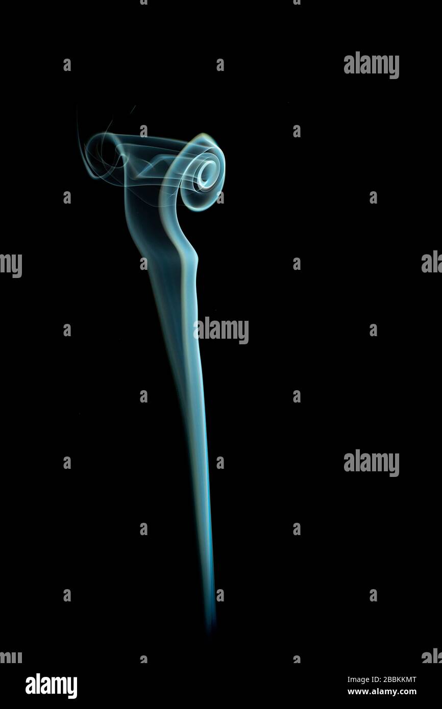 colored smoke shapes with black background Stock Photo