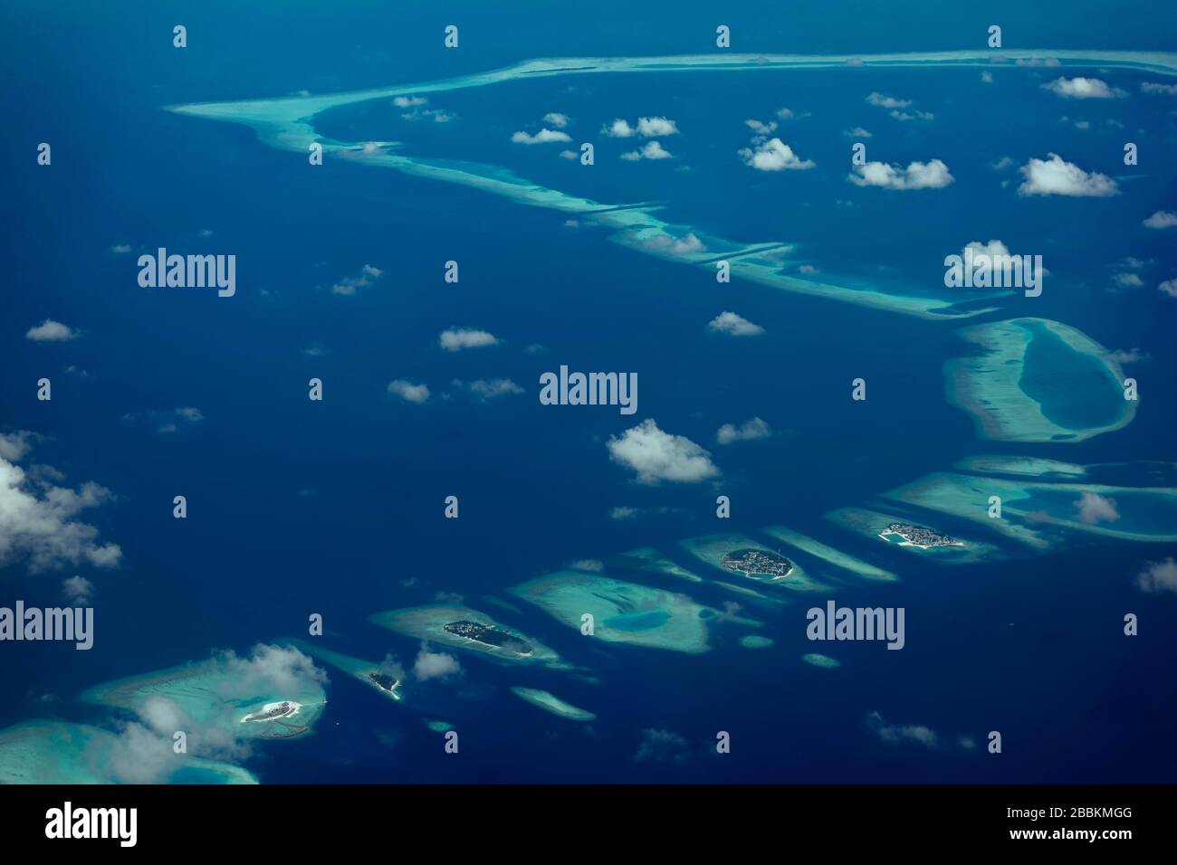 Chain of inhabited islands, from right Keyodhoo, Felidhoo, Thinadhoo, Arah Beach Resort, Vaavu Atoll or Felidhu Atoll, Indian Ocean, Maldives Stock Photo