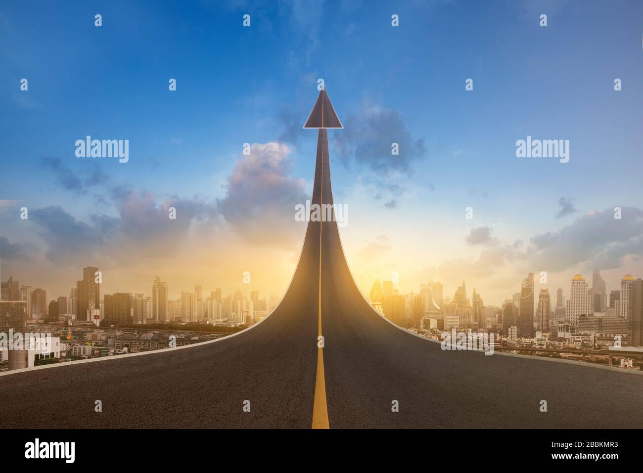 A road turning into an arrow rising upward on city background, symbolizing the direction to success in the future as a symbol of business vision. Stock Photo