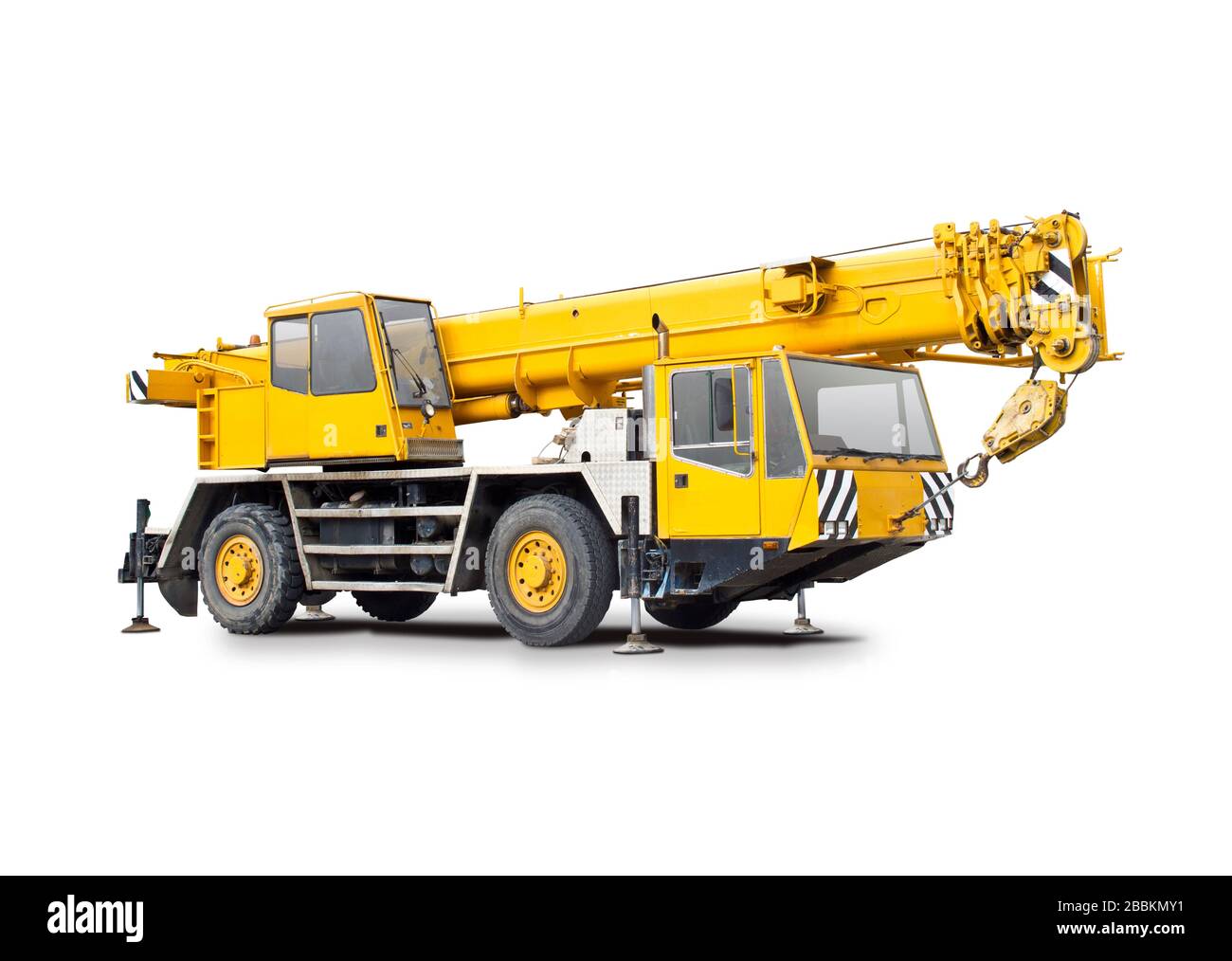 Yellow mobile crane truck side view isolated on white Yellow mobile crane truck side view isolated on white Stock Photo