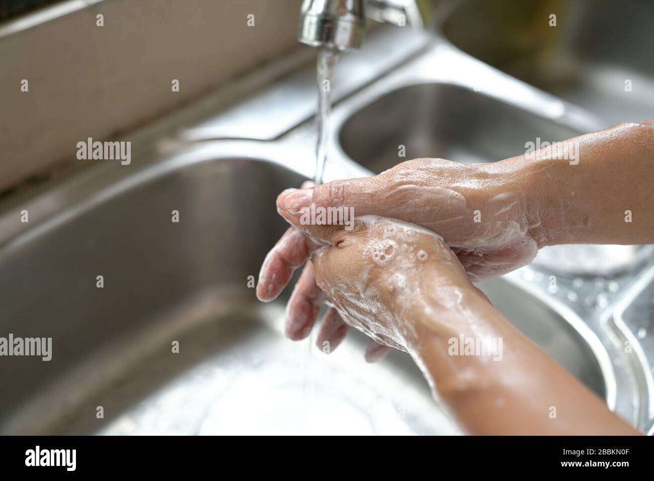 Washing hands rubbing with soap. Hygiene concept, prevention from spreading coronavirus or germs