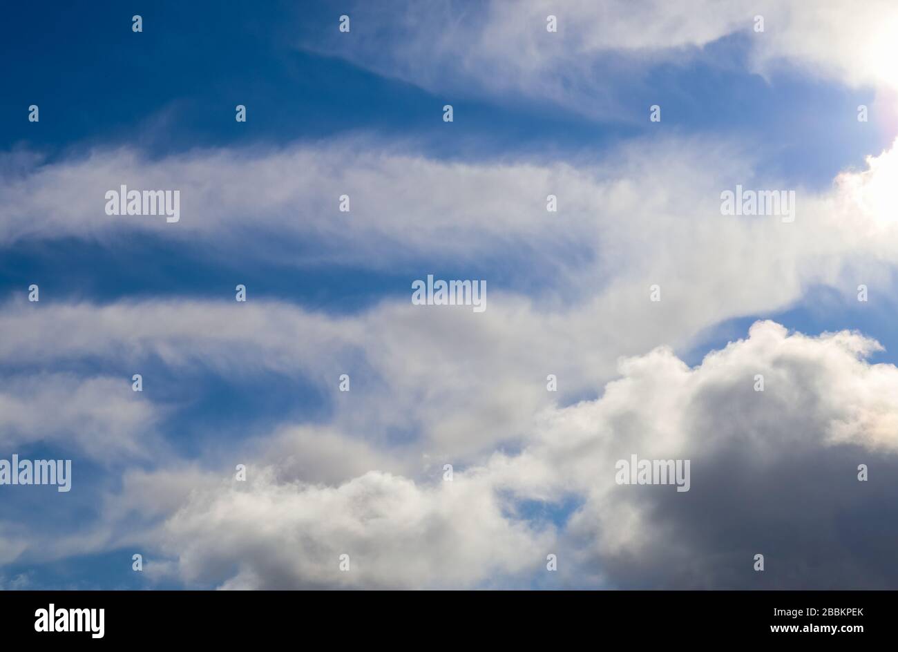 Beautiful white fluffy clouds in a blue sky on a sunny summer day Stock ...